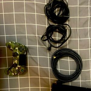 500GB PS4 with Camo controller. Has a couple games installed comes with cables